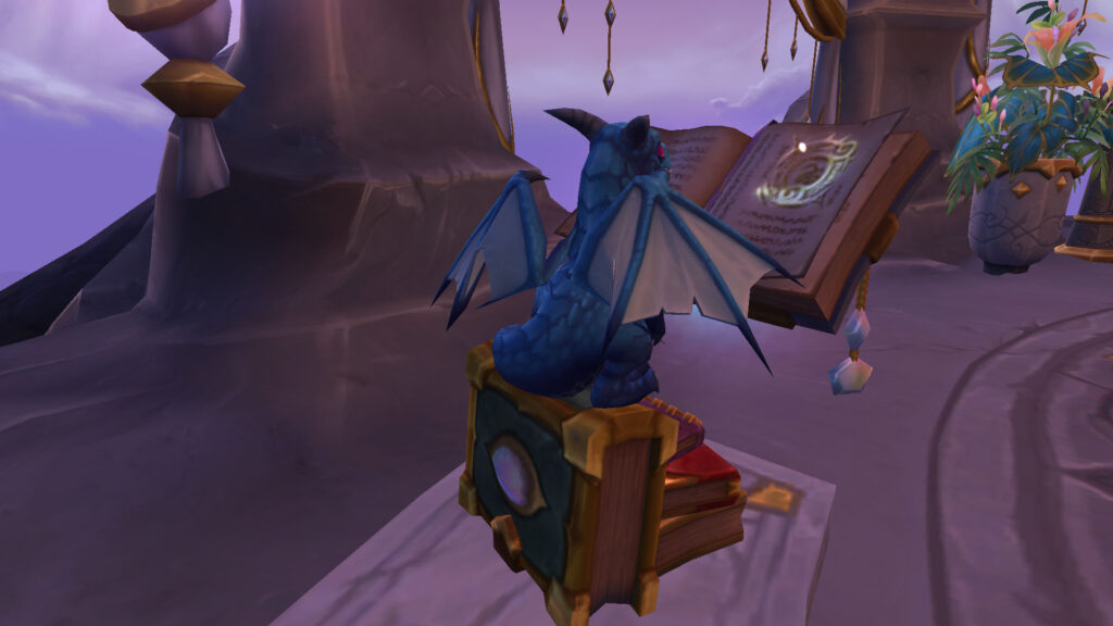WoW the dragon is reading a book